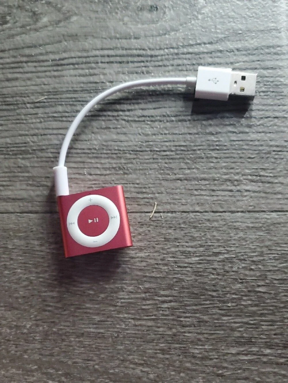 Vintage pink Apple iPod Shuffle (4th Generation, 2GB storage, Model A1373).
